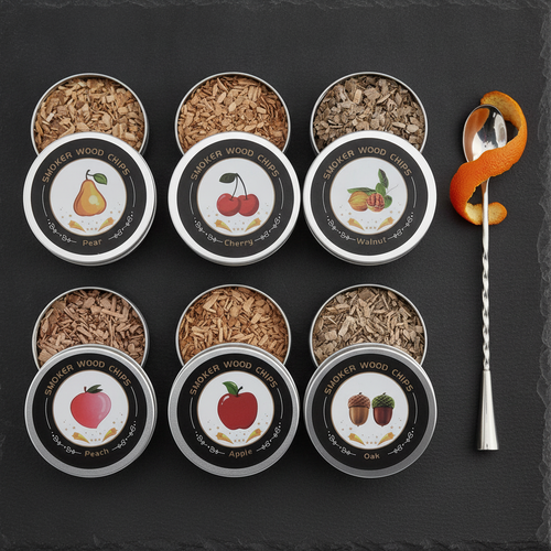 Overhead view of six wood chip tins on dark slate with a bar spoon and orange peel